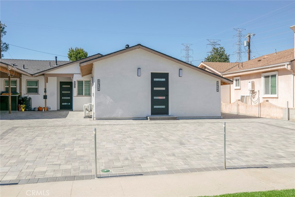 11321 Collett Avenue Granada Hills, CA 91344 - Photo 2 of 11 a view of white house