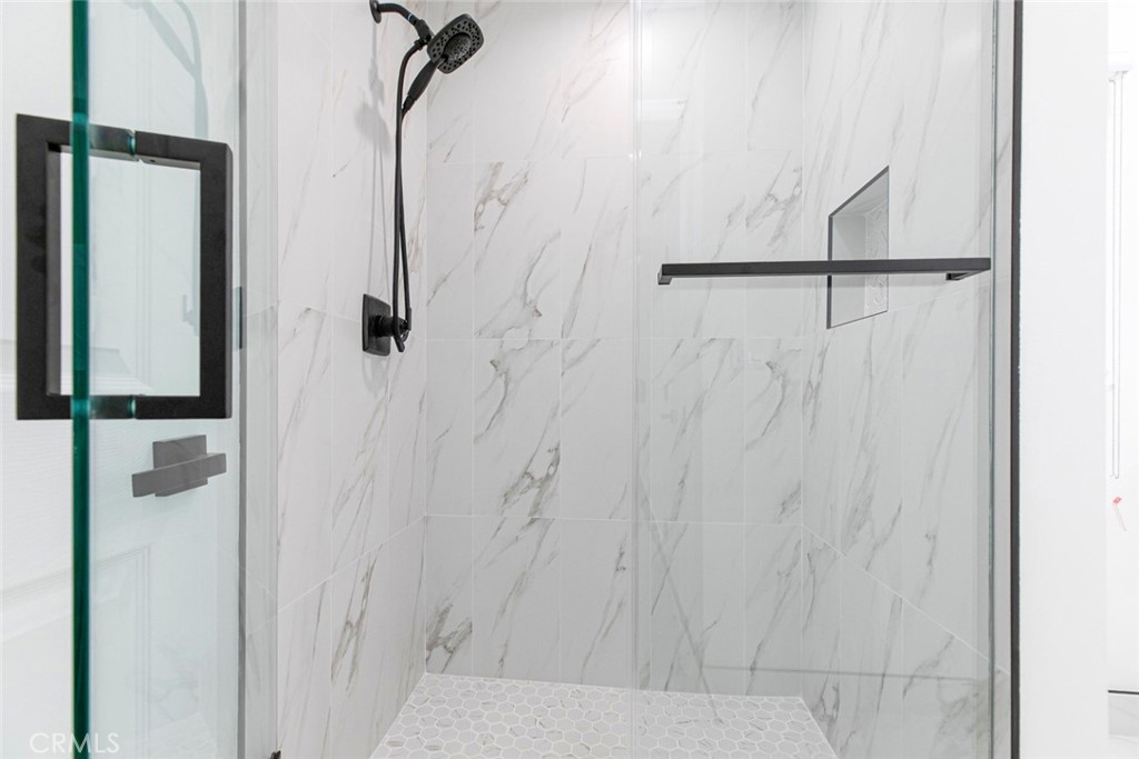 11321 Collett Avenue Granada Hills, CA 91344 - Photo 10 of 11 a bathroom with a shower