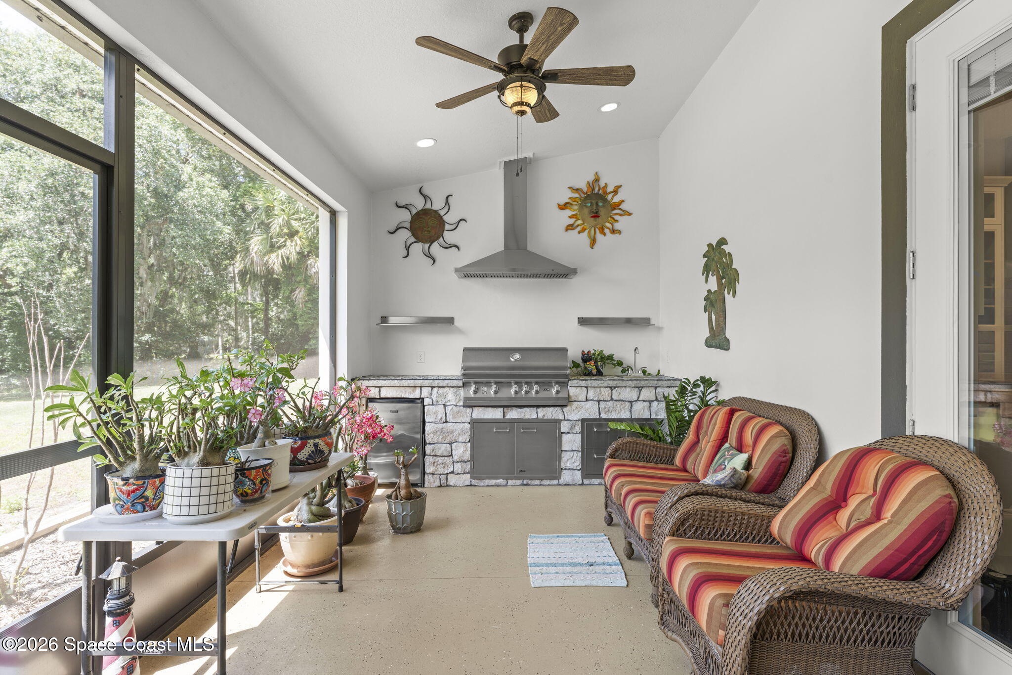 1740 Ford Road Mims, FL 32754 - Photo 34 of 43 a living room with furniture potted plant and a window