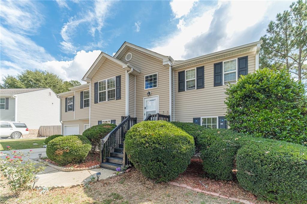 1185 Wendy Way Winder, GA 30680 - Photo 3 of 46 a view of a house with a backyard