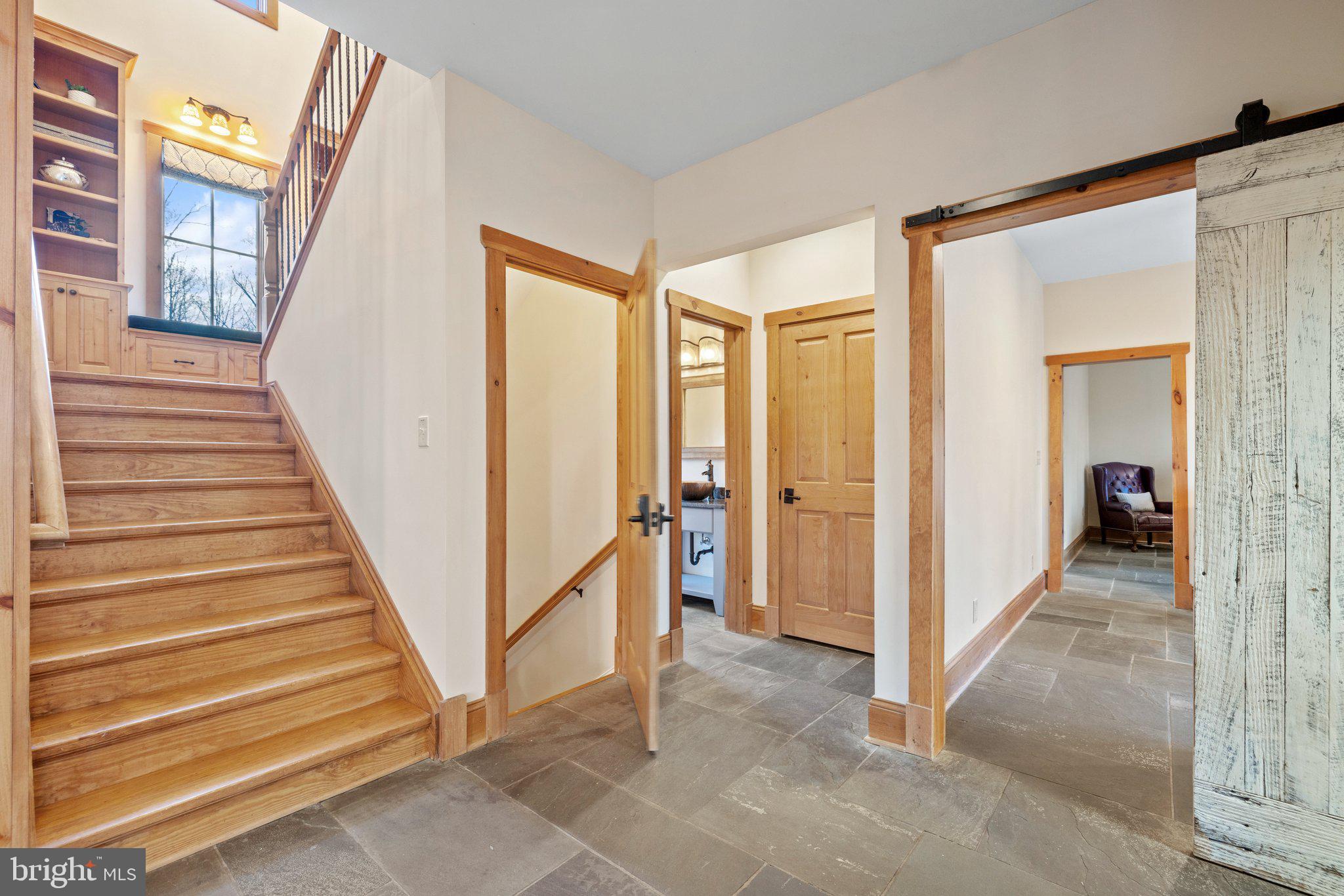 6416 Weadon Ridge Lane Marshall, VA 20115 - Photo 40 of 92 Main Hall Opens to Half Bath & Private Wing