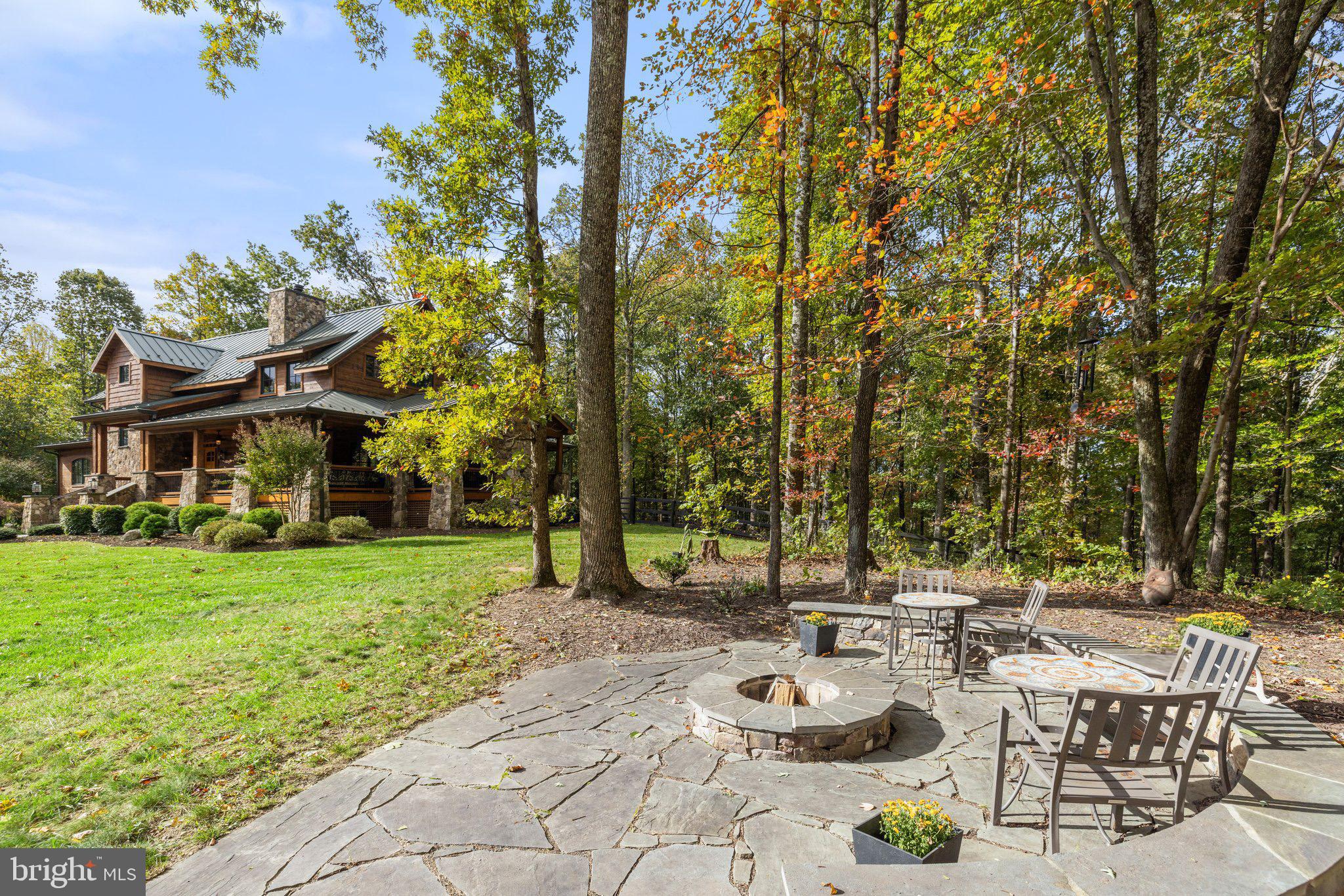 6416 Weadon Ridge Lane Marshall, VA 20115 - Photo 5 of 92 Side Stone Patio with Firepit Opens to Front Yard