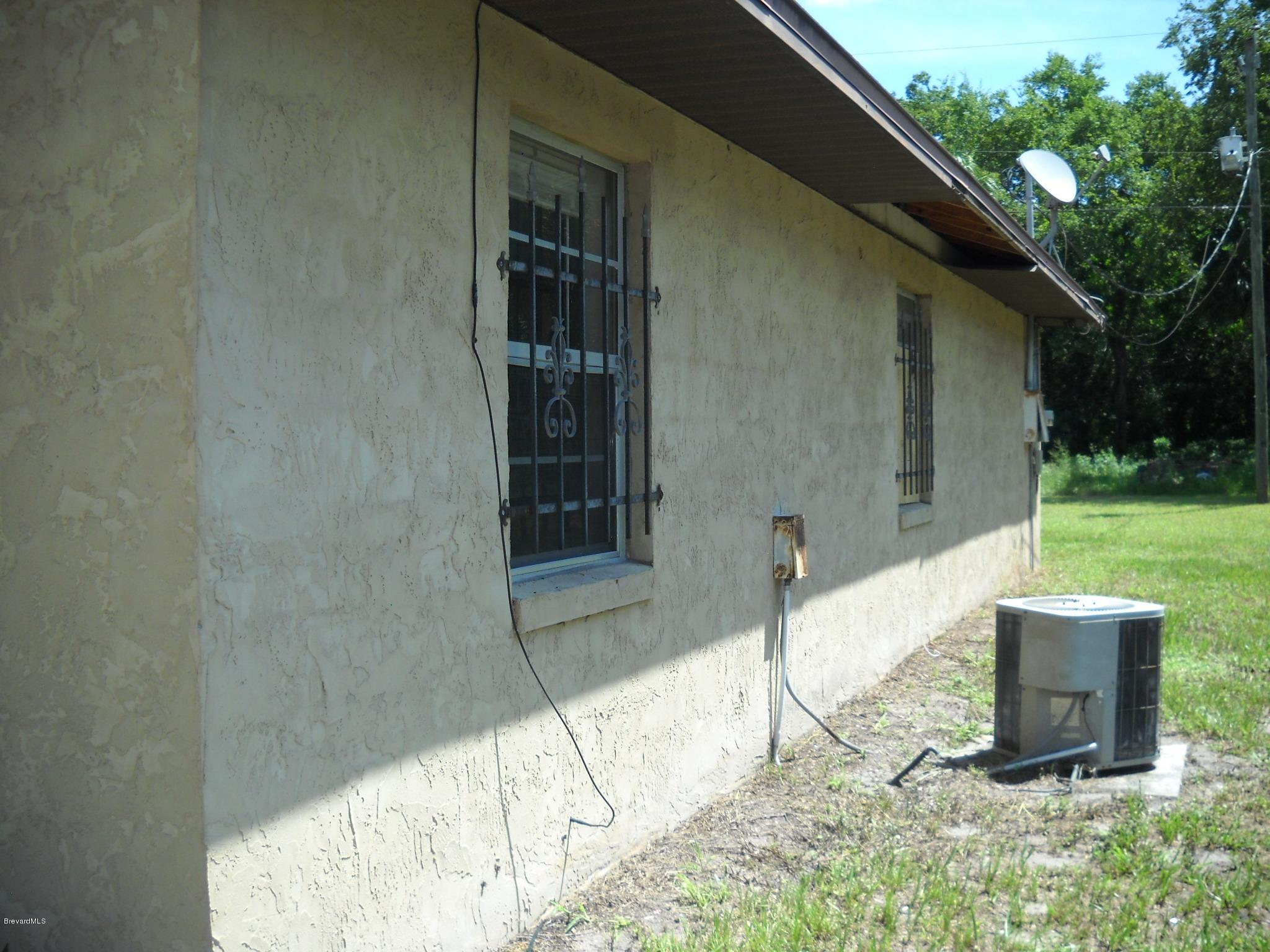 980 Santa Rosa Drive Rockledge, FL 32955 - Photo 12 of 15 Right exterior side view