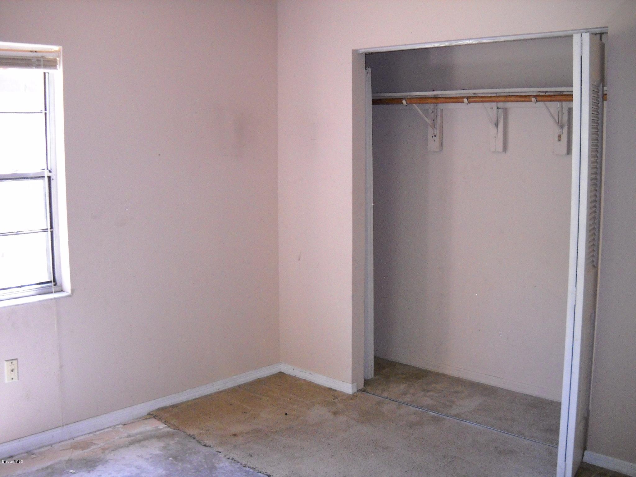 980 Santa Rosa Drive Rockledge, FL 32955 - Photo 7 of 15 Master bedroom closet view
