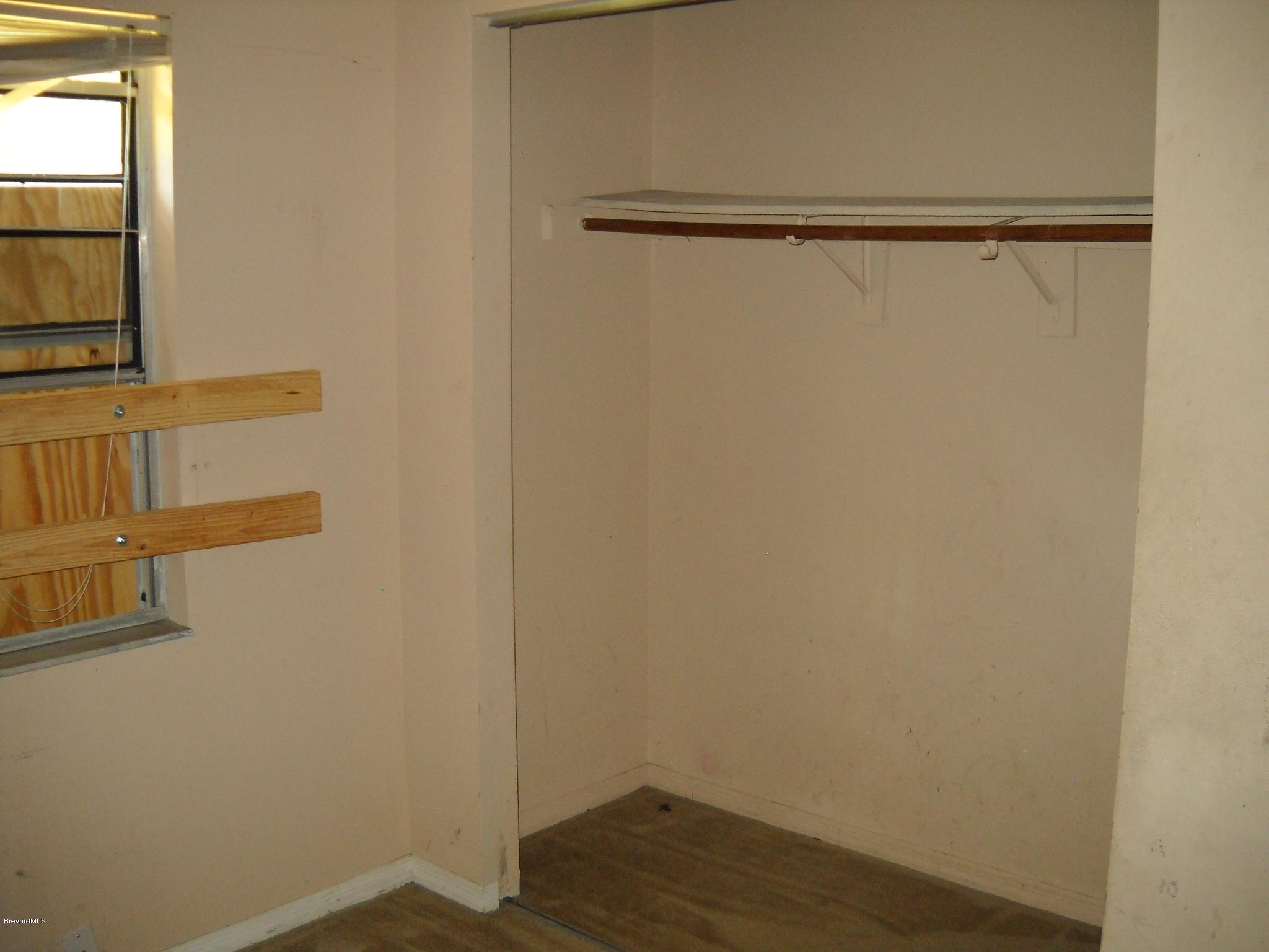 980 Santa Rosa Drive Rockledge, FL 32955 - Photo 9 of 15 2nd bedroom closet view