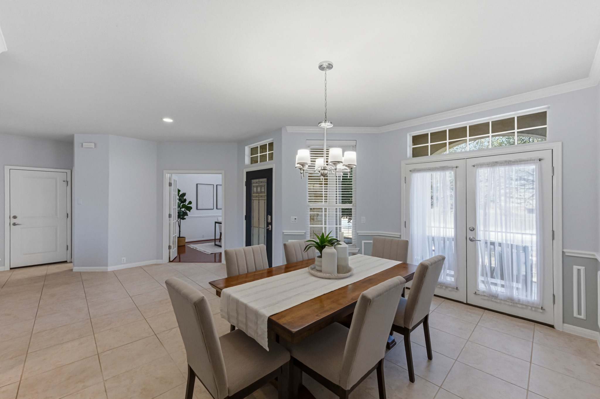 1023 Grassy Field Road Austin, TX 78737 - Photo 17 of 39 a view of a dining room with furniture window and wooden floor