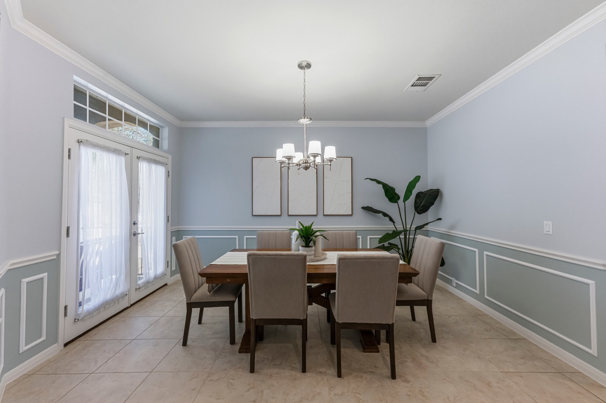 1023 Grassy Field Road Austin, TX 78737 - Photo 18 of 39 a view of a dining room with furniture and chandelier