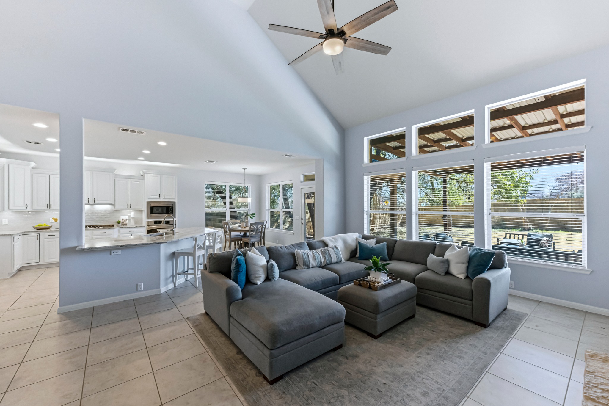 1023 Grassy Field Road Austin, TX 78737 - Photo 2 of 39 a living room with furniture and a large window