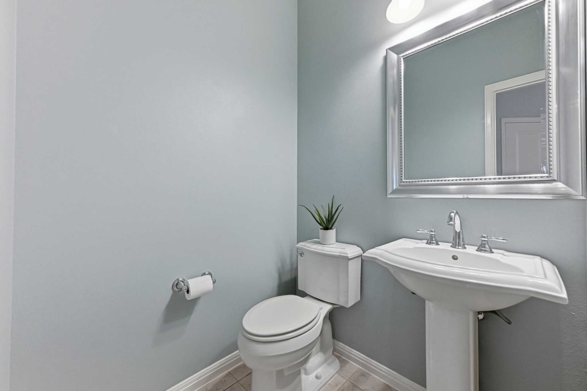 1023 Grassy Field Road Austin, TX 78737 - Photo 31 of 39 a bathroom with a sink toilet and a mirror
