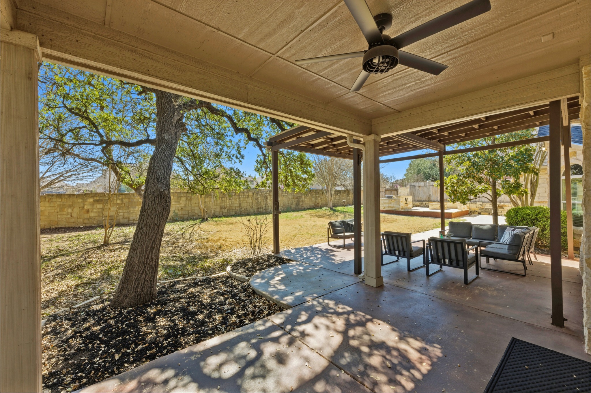 1023 Grassy Field Road Austin, TX 78737 - Photo 35 of 39 a living room with large windows