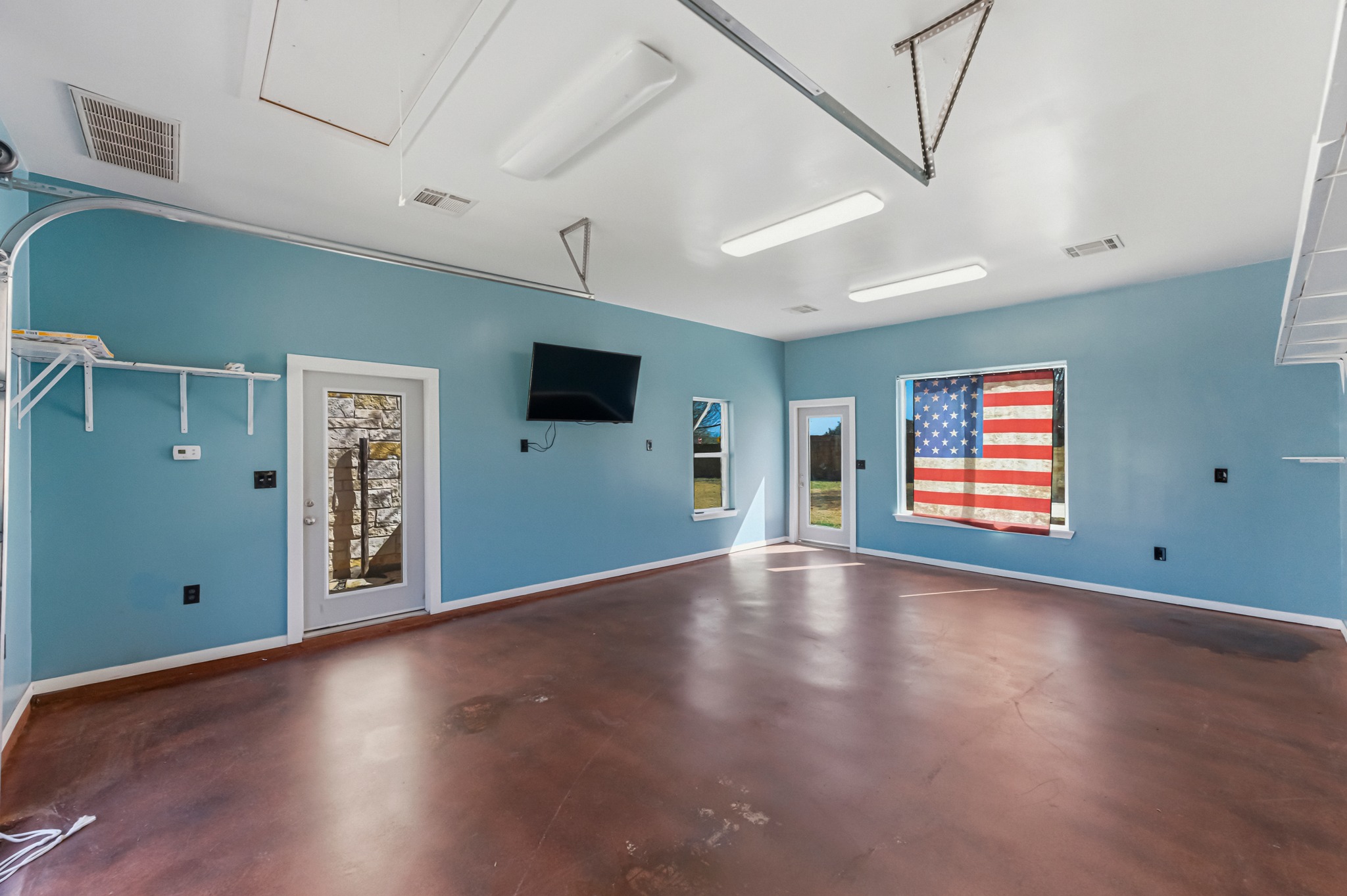 1023 Grassy Field Road Austin, TX 78737 - Photo 39 of 39 a view of an empty room with wooden floor and a window
