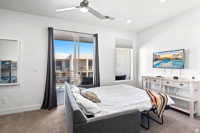 1122 South 1790th Street West, Unit 2 St. George, UT 84770 - Photo 14 of 37 Carpeted room featuring a ceiling fan with integrated lighting, recessed ceiling lights, and a sliding glass door opening to a balcony
