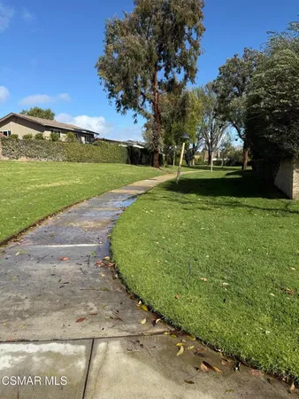 a view of a golf course with a lake