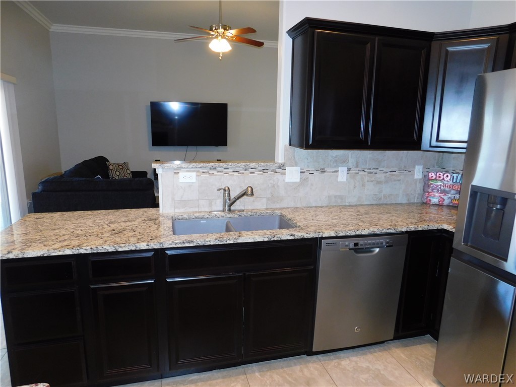 3370 South Ridge Avenue Bullhead City, AZ 86429 - Photo 34 of 56 a bathroom with double sink and a mirror
