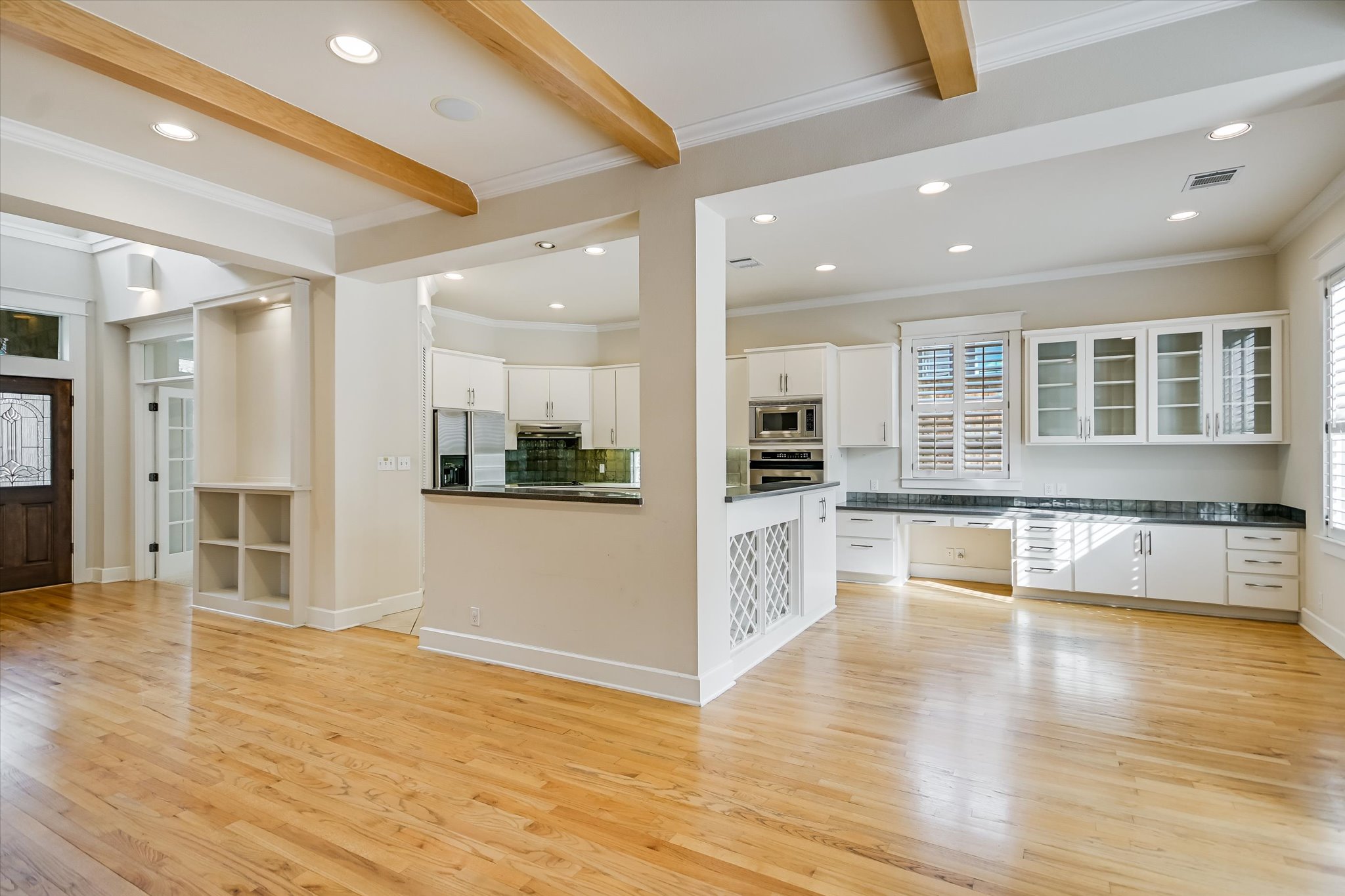 703 Pressler Street Austin, TX 78703 - Photo 12 of 24 a view of large kitchen with wooden floor and center dining table