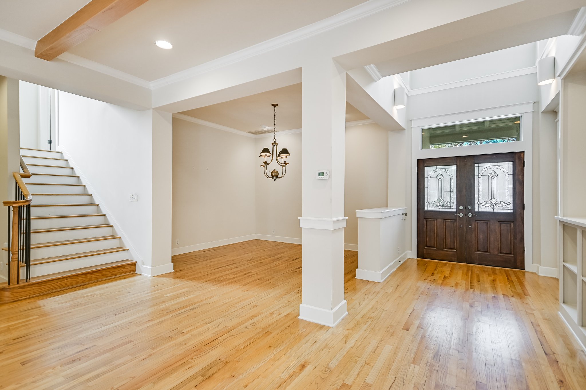 703 Pressler Street Austin, TX 78703 - Photo 5 of 24 a view of a hallway with wooden floor and entryway