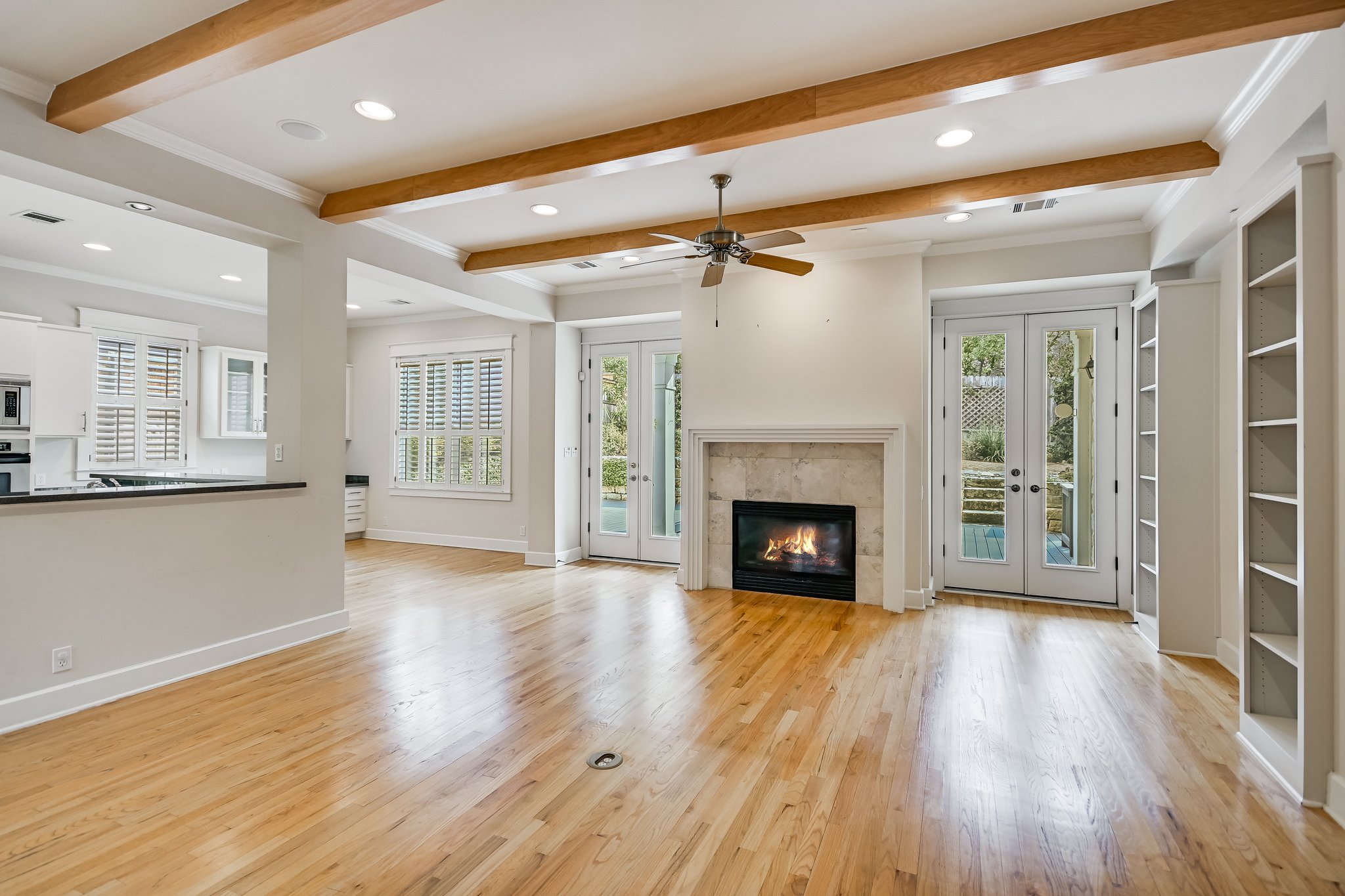 703 Pressler Street Austin, TX 78703 - Photo 7 of 24 a view of a livingroom with wooden floor and a fireplace