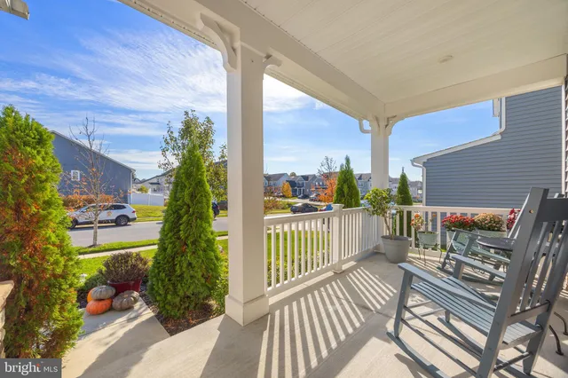 a view of balcony with furniture