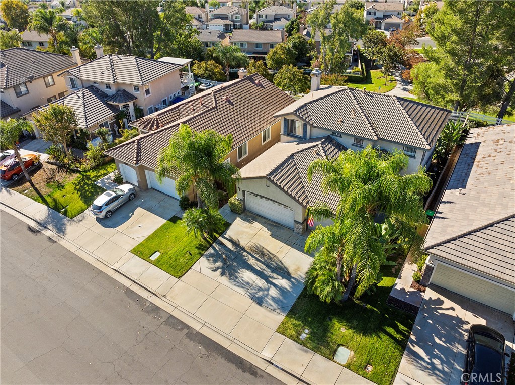 32921 Adelante Street Temecula, CA 92592 - Photo 44 of 48 an aerial view of residential houses with yard