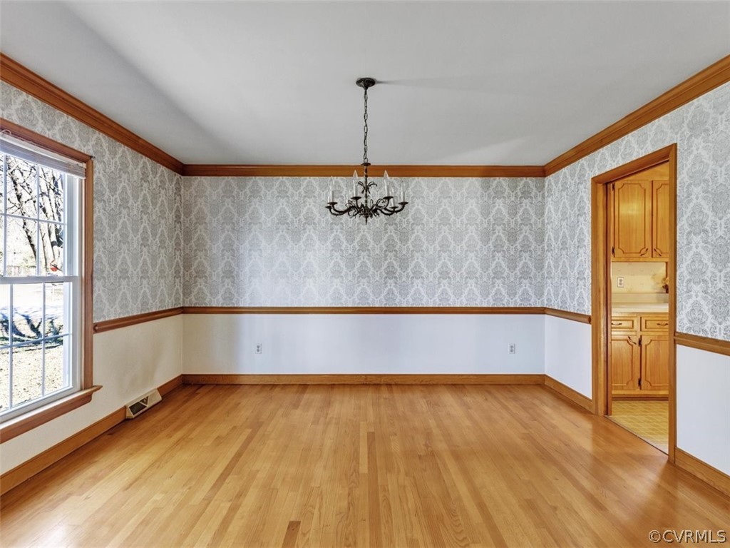 9701 Alfaree Road Richmond, VA 23237 - Photo 8 of 27 Dining room with crown molding and chair rail