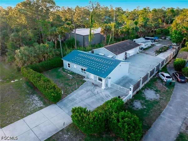 an aerial view of a house having yard