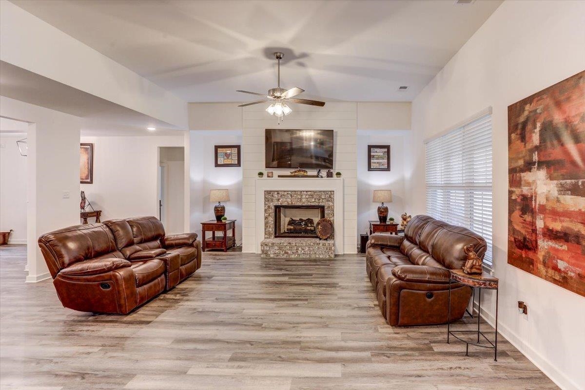 810 Mebane Road Oakland, TN 38060 - Photo 6 of 27 a living room with furniture fireplace and flat screen tv