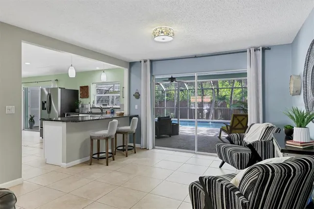 a living room with furniture and a table
