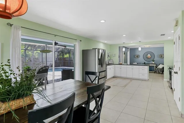 a view of a livingroom with furniture and a potted plant