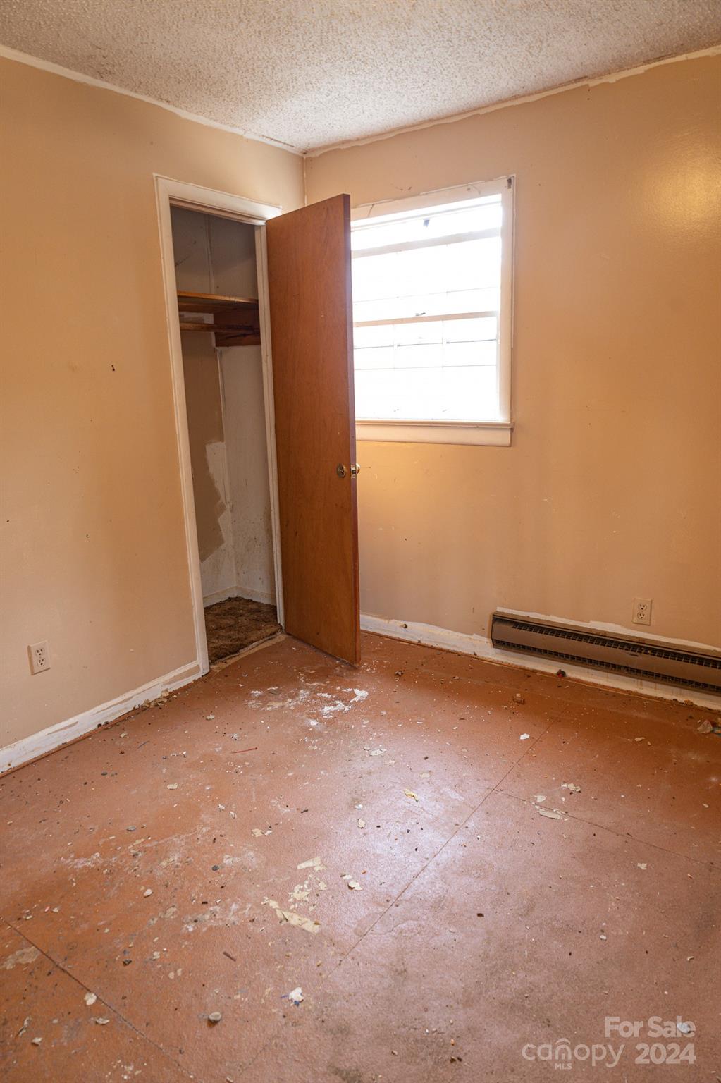 30 Panther Branch Road Canton, NC 28716 - Photo 6 of 13 an empty room with windows