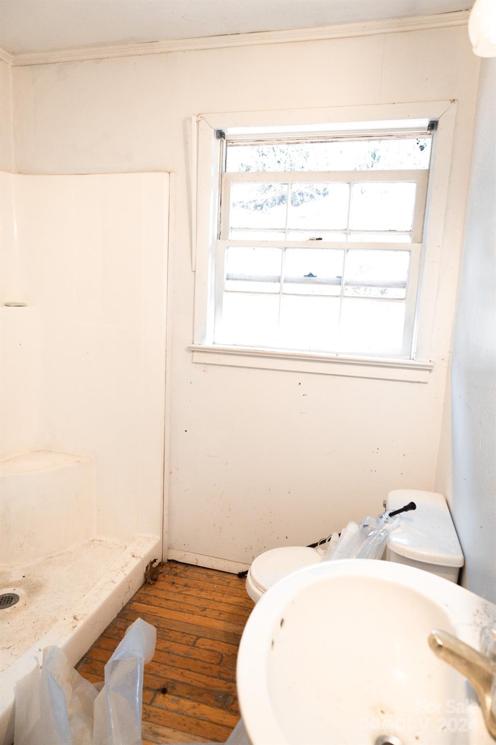 30 Panther Branch Road Canton, NC 28716 - Photo 9 of 13 a bathroom with a sink and a window