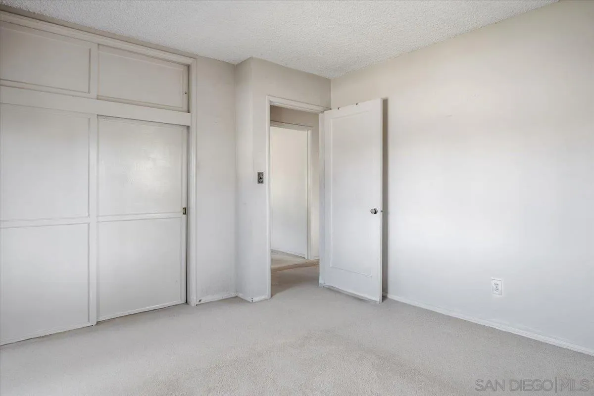 3711 Racine Road San Diego, CA 92115 - Photo 25 of 44 an empty room with closet area