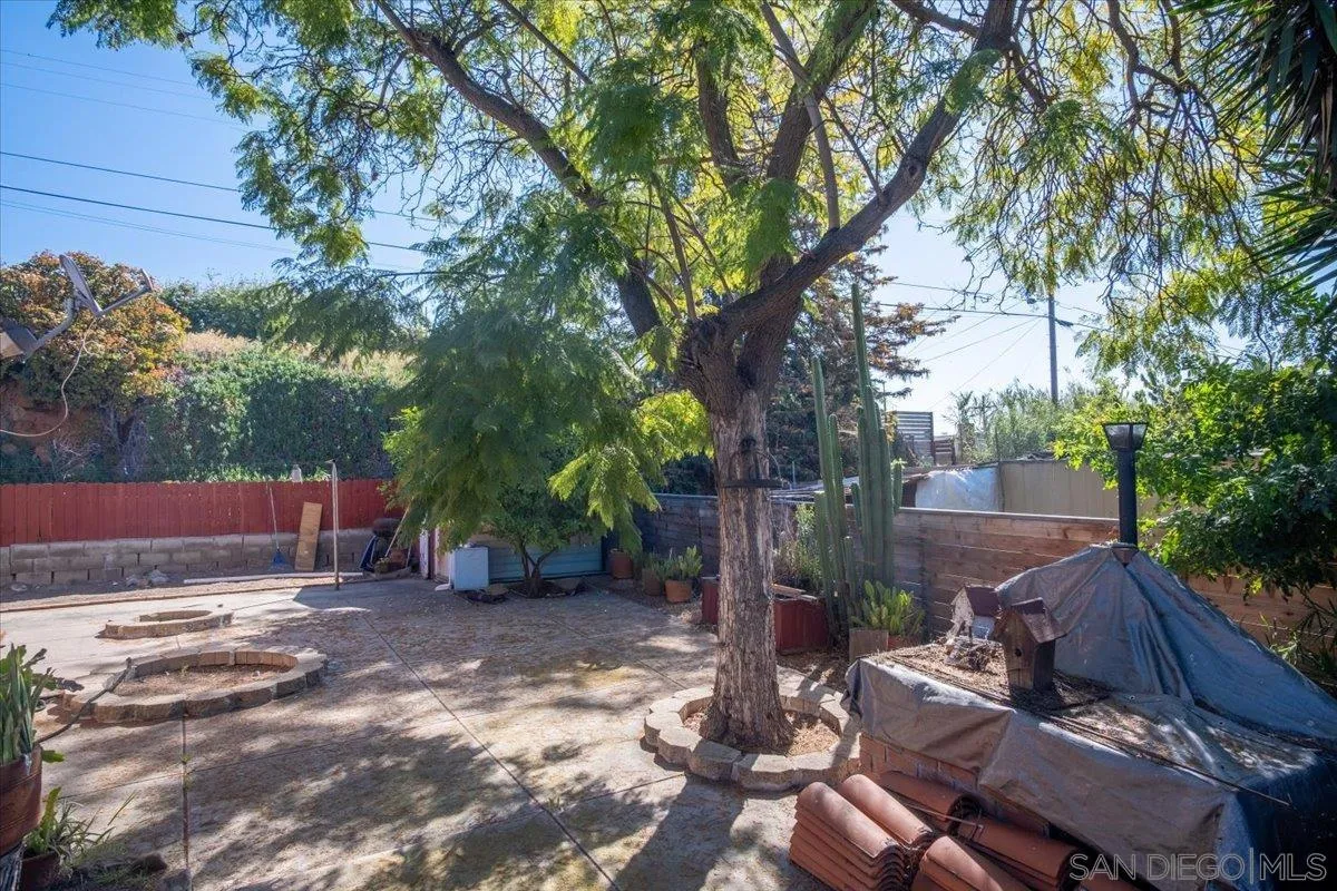 3711 Racine Road San Diego, CA 92115 - Photo 32 of 44 a view of yard with green space and seating area
