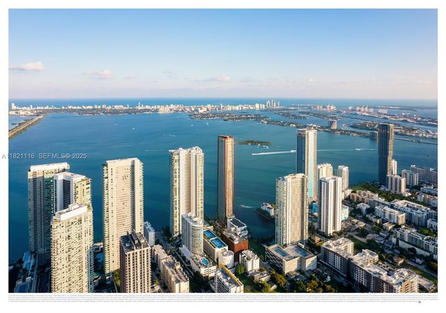 a view of a city with tall buildings