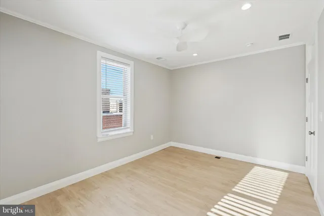 a view of a hallway with closet