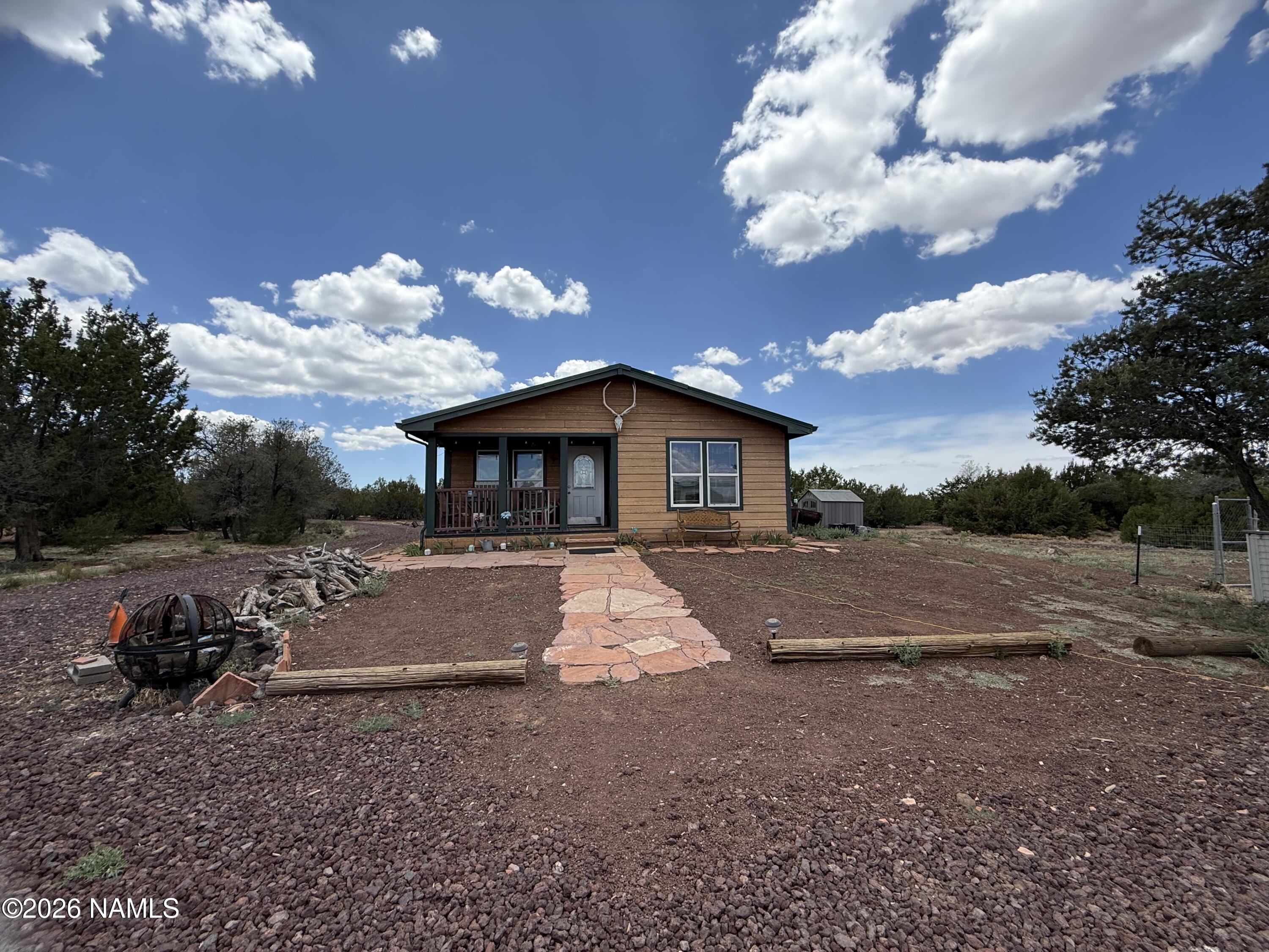 1431 East Cedar Road Williams, AZ 86046 - Photo 2 of 51 a view of house and outdoor space
