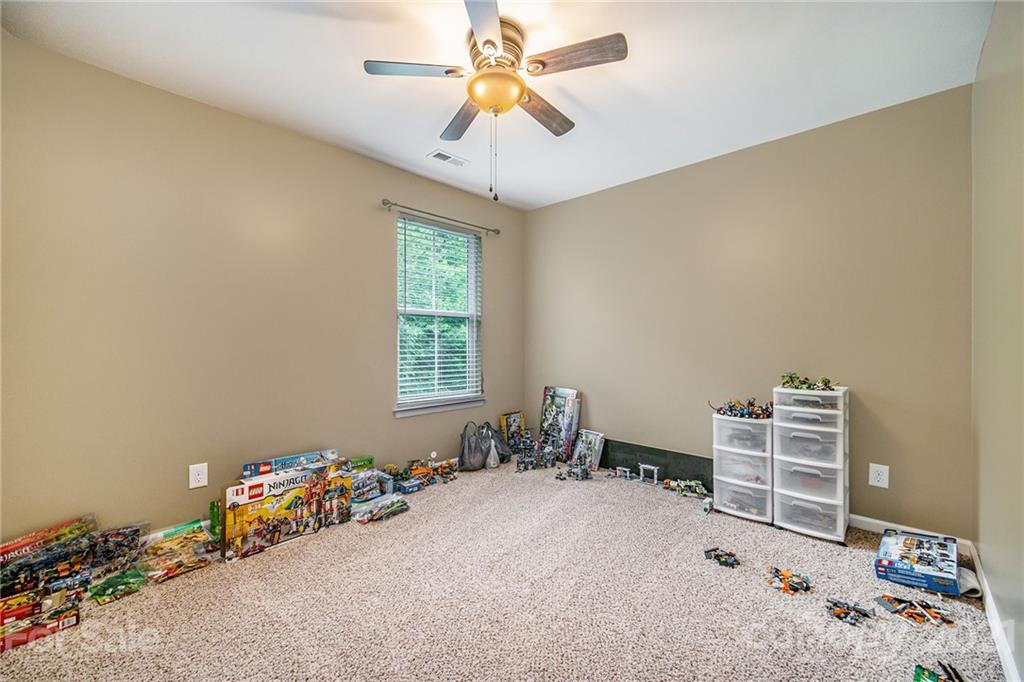 7678 West Berkeley Road Denver, NC 28037 - Photo 16 of 29 wooden floor in a room with a window