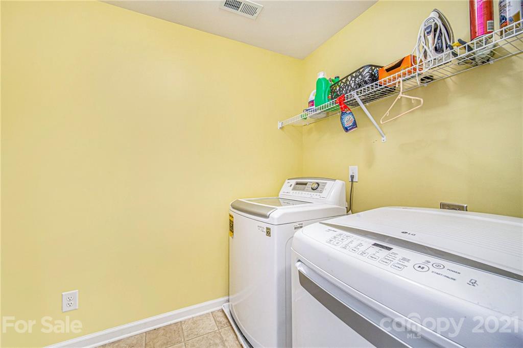 7678 West Berkeley Road Denver, NC 28037 - Photo 25 of 29 a utility room with dryer and washer