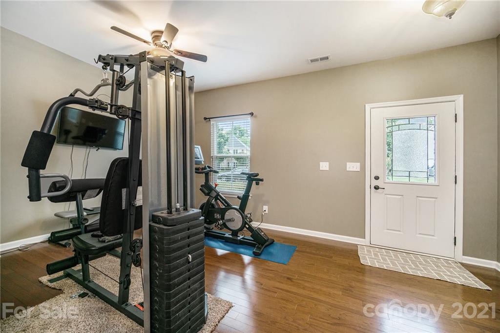 7678 West Berkeley Road Denver, NC 28037 - Photo 4 of 29 a view of a room with gym equipment