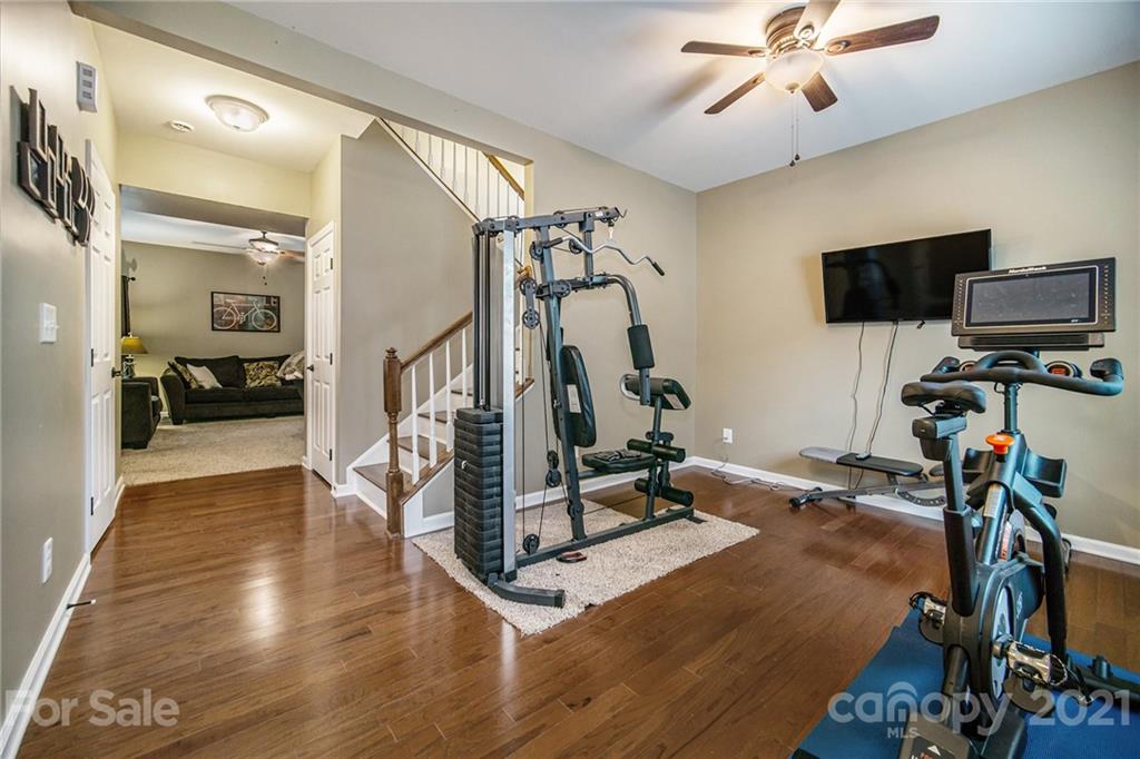 7678 West Berkeley Road Denver, NC 28037 - Photo 5 of 29 a view of a room with gym equipment