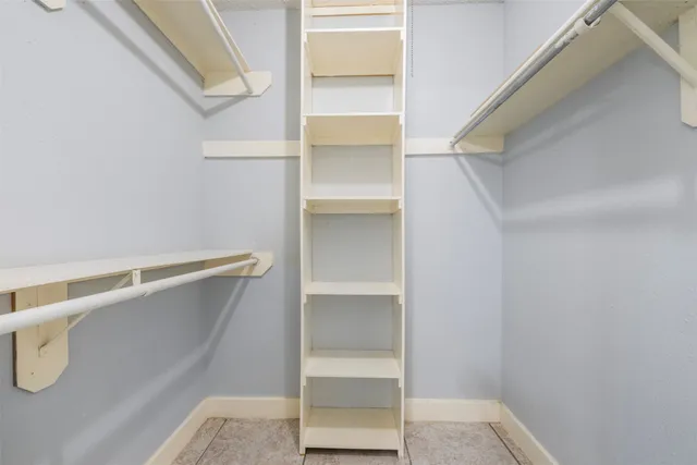 a view of an empty walk in closet