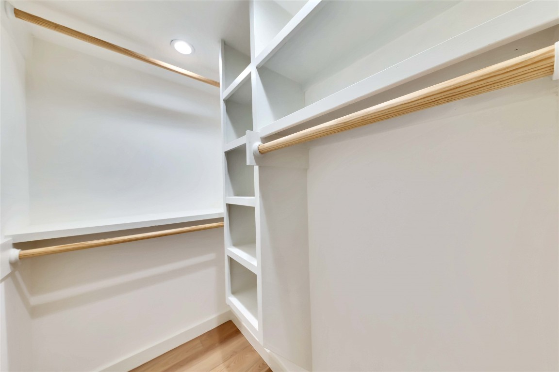 2020 South Congress Avenue, Unit 1224 Austin, TX 78704 - Photo 16 of 26 a view of walk in closet with empty racks