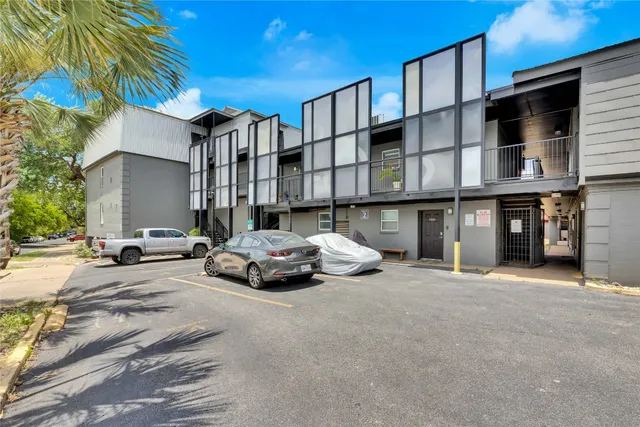 a car parked in front of a building