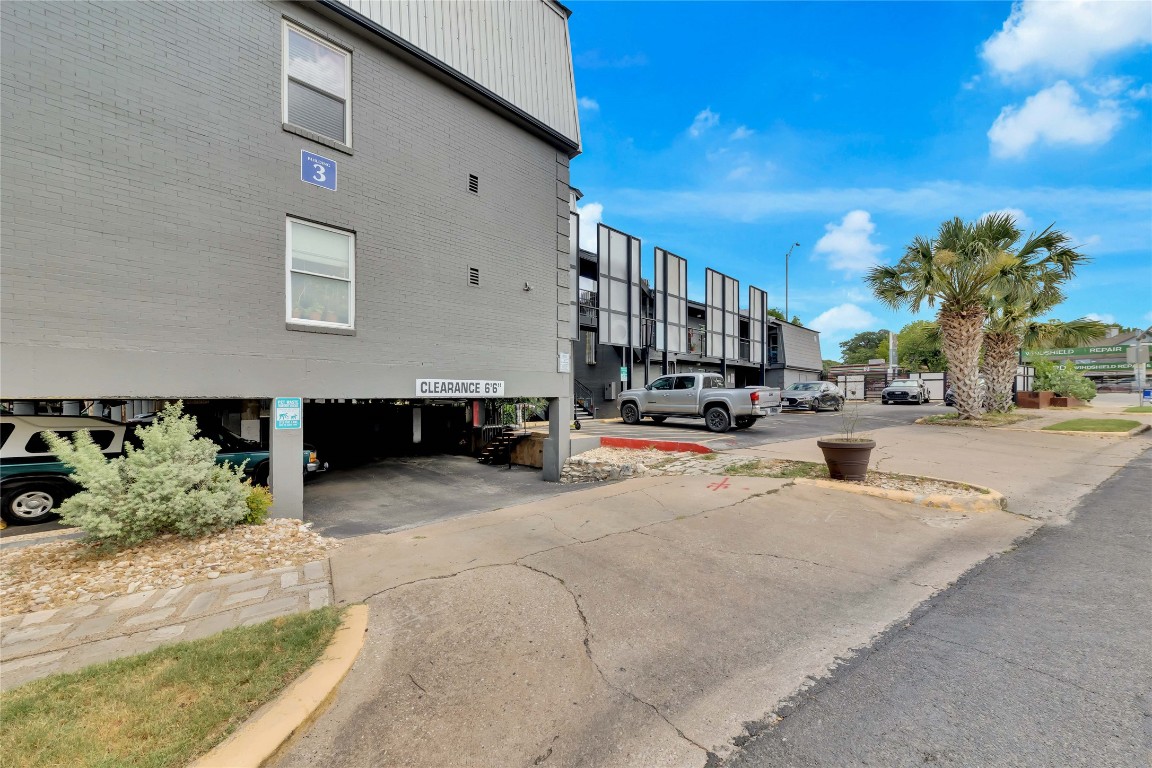 2020 South Congress Avenue, Unit 1224 Austin, TX 78704 - Photo 22 of 26 a view of building with car parked