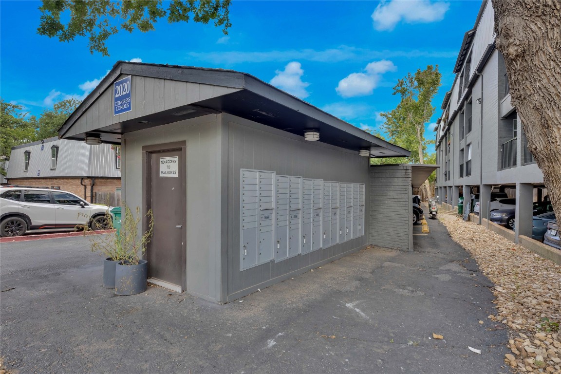 2020 South Congress Avenue, Unit 1224 Austin, TX 78704 - Photo 23 of 26 a front view of a house with a yard