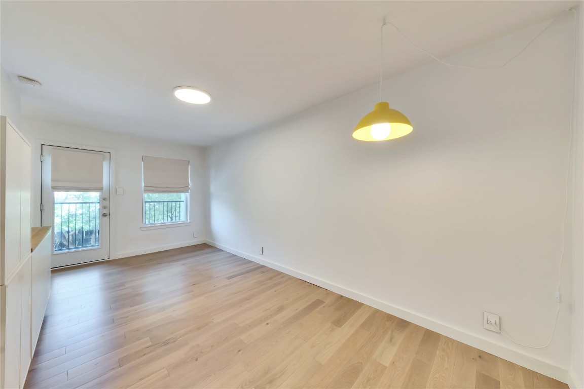 2020 South Congress Avenue, Unit 1224 Austin, TX 78704 - Photo 7 of 26 a view of an empty room and window