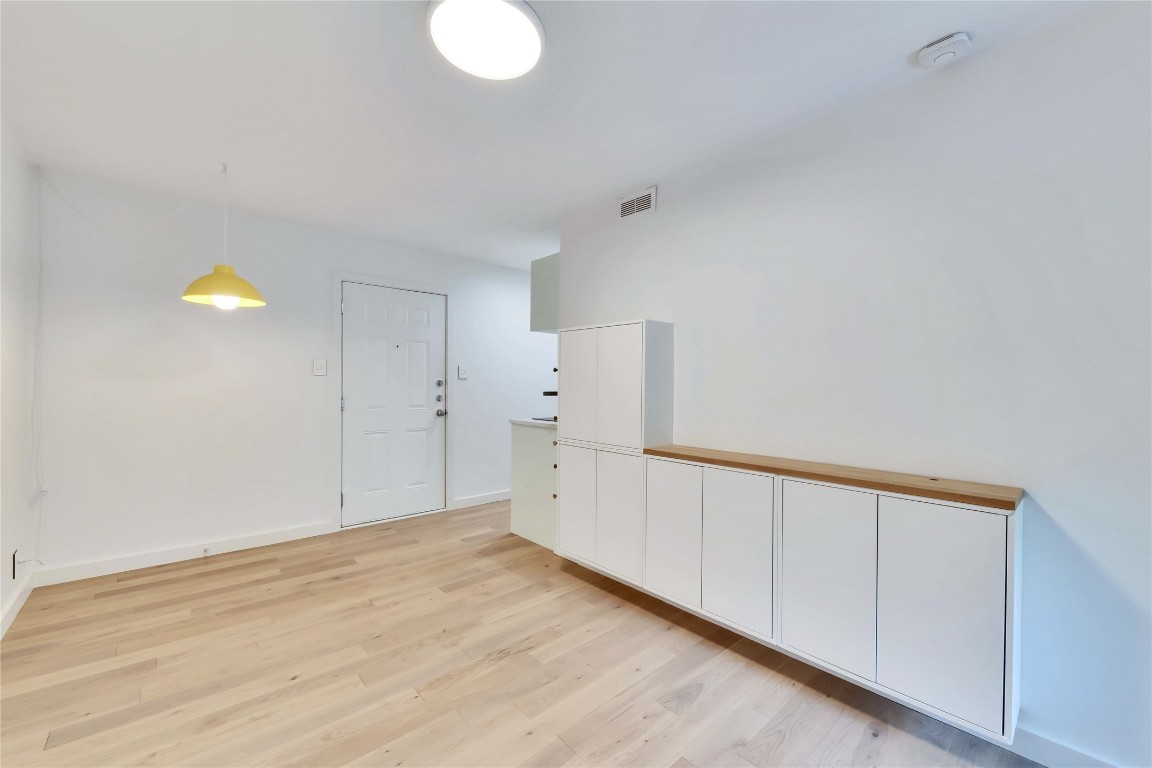 2020 South Congress Avenue, Unit 1224 Austin, TX 78704 - Photo 8 of 26 a view of an empty room with a window