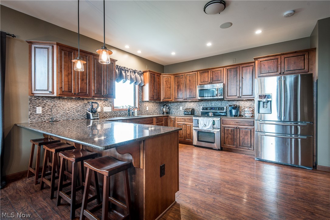 6144 Smith Road Southwest Navarre, OH 44662 - Photo 13 of 35 Kitchen with bar seating