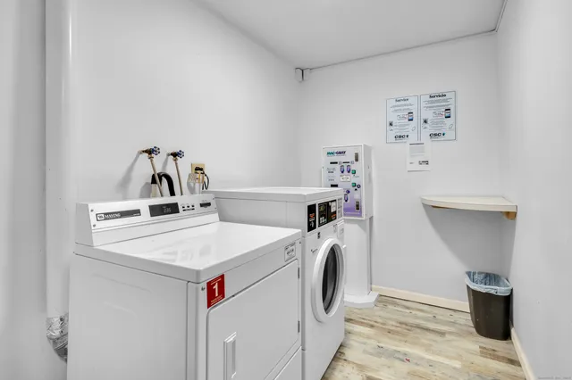 a view of an empty room with glass door