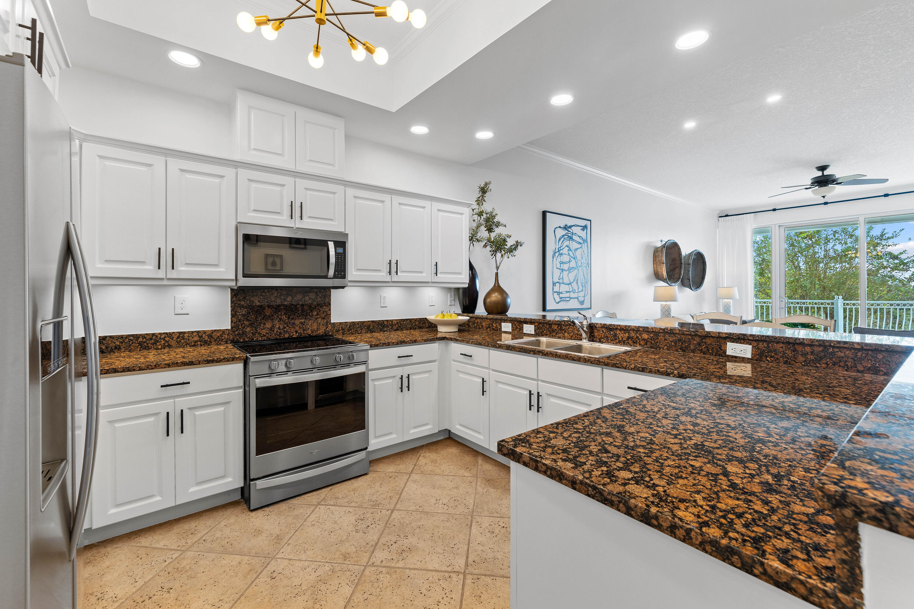 9961 East County Highway 30A, Unit 205 Inlet Beach, FL 32461 - Photo 17 of 45 a large kitchen with cabinets appliances and a counter space