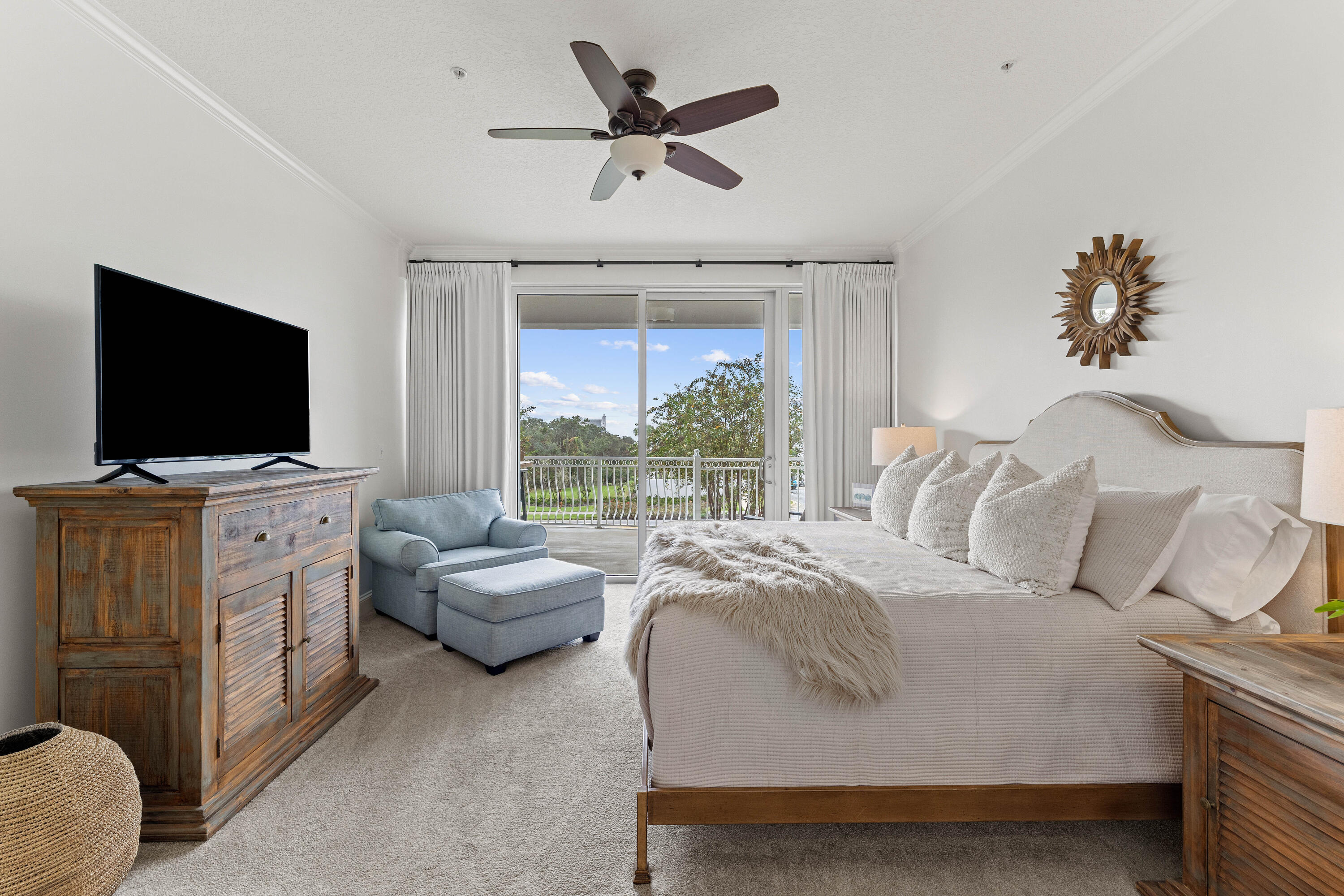 9961 East County Highway 30A, Unit 205 Inlet Beach, FL 32461 - Photo 20 of 45 a living room with furniture and a flat screen tv